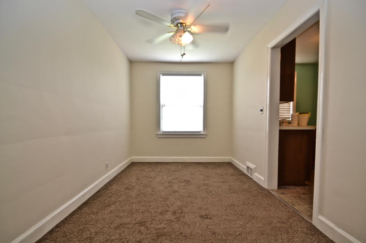 207 Cherokee Road Nashville, TN 37205 - Photo 5 of 24 an empty room with windows and fan