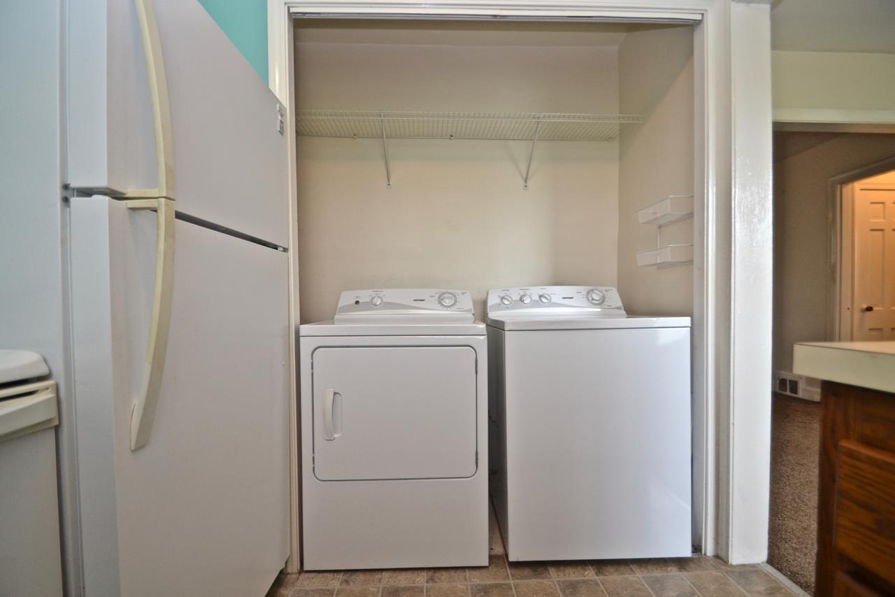 207 Cherokee Road Nashville, TN 37205 - Photo 8 of 24 a utility room with dryer and washer