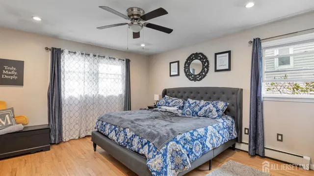 a bathroom with a toilet and shower