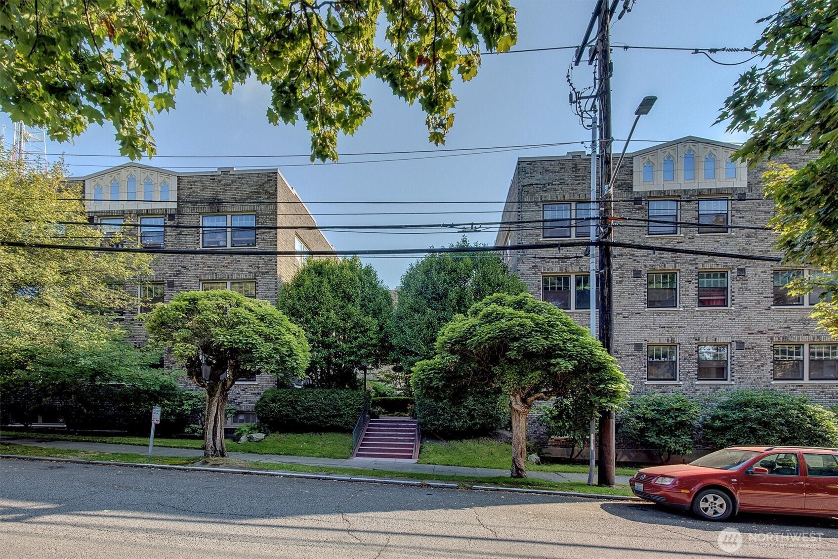 1605 East Olive Street, Unit 303 Seattle, WA 98122 - Photo 29 of 36 a view of street with parked cars