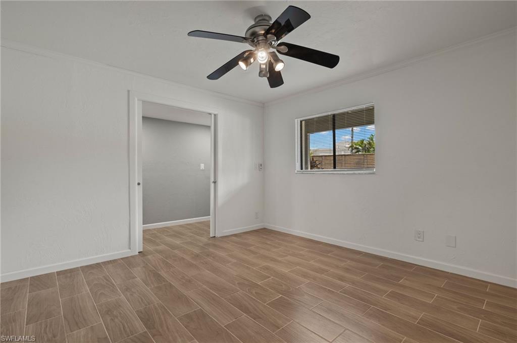 16540 Partridge Club Road, Unit 103 Fort Myers, FL 33908 - Photo 22 of 36 a view of an empty room with a window
