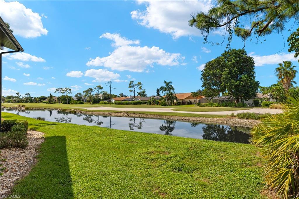 16540 Partridge Club Road, Unit 103 Fort Myers, FL 33908 - Photo 27 of 36 a view of an outdoor space and a lake view