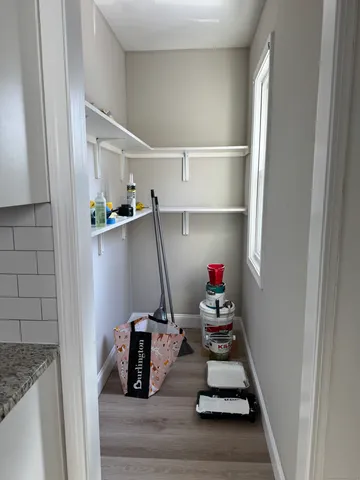 a room with storage and utility