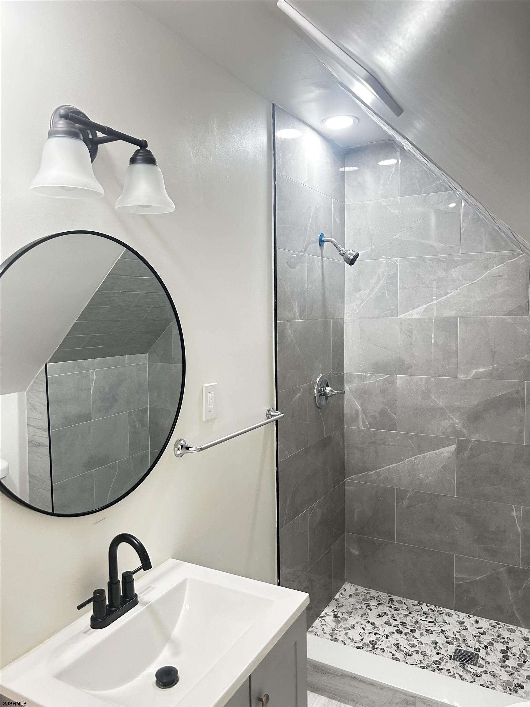 715 Ramah Road Millville, NJ 08332 - Photo 12 of 42 a bathroom with a sink and mirror