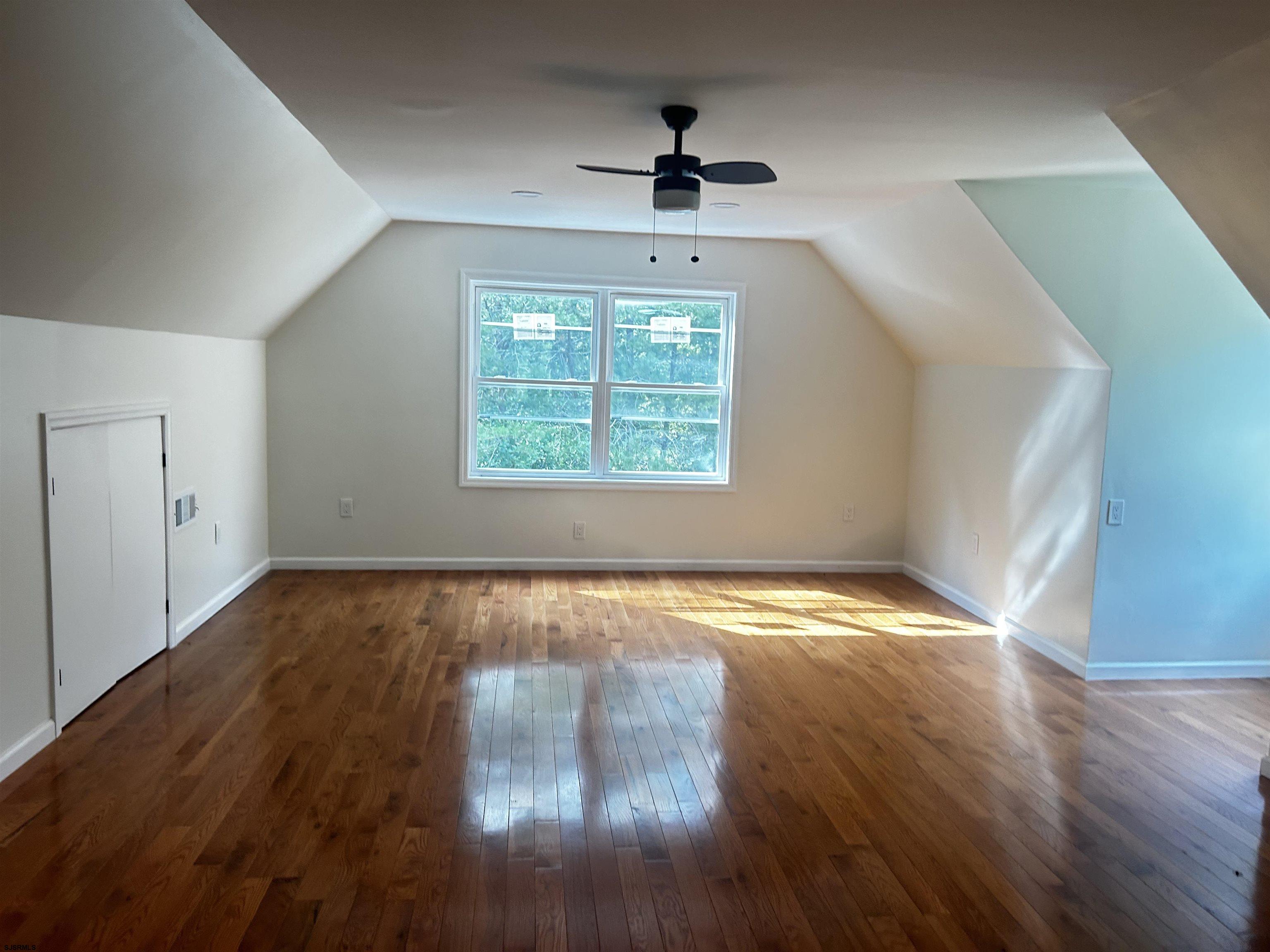 715 Ramah Road Millville, NJ 08332 - Photo 15 of 42 a view of empty room with wooden floor and fan