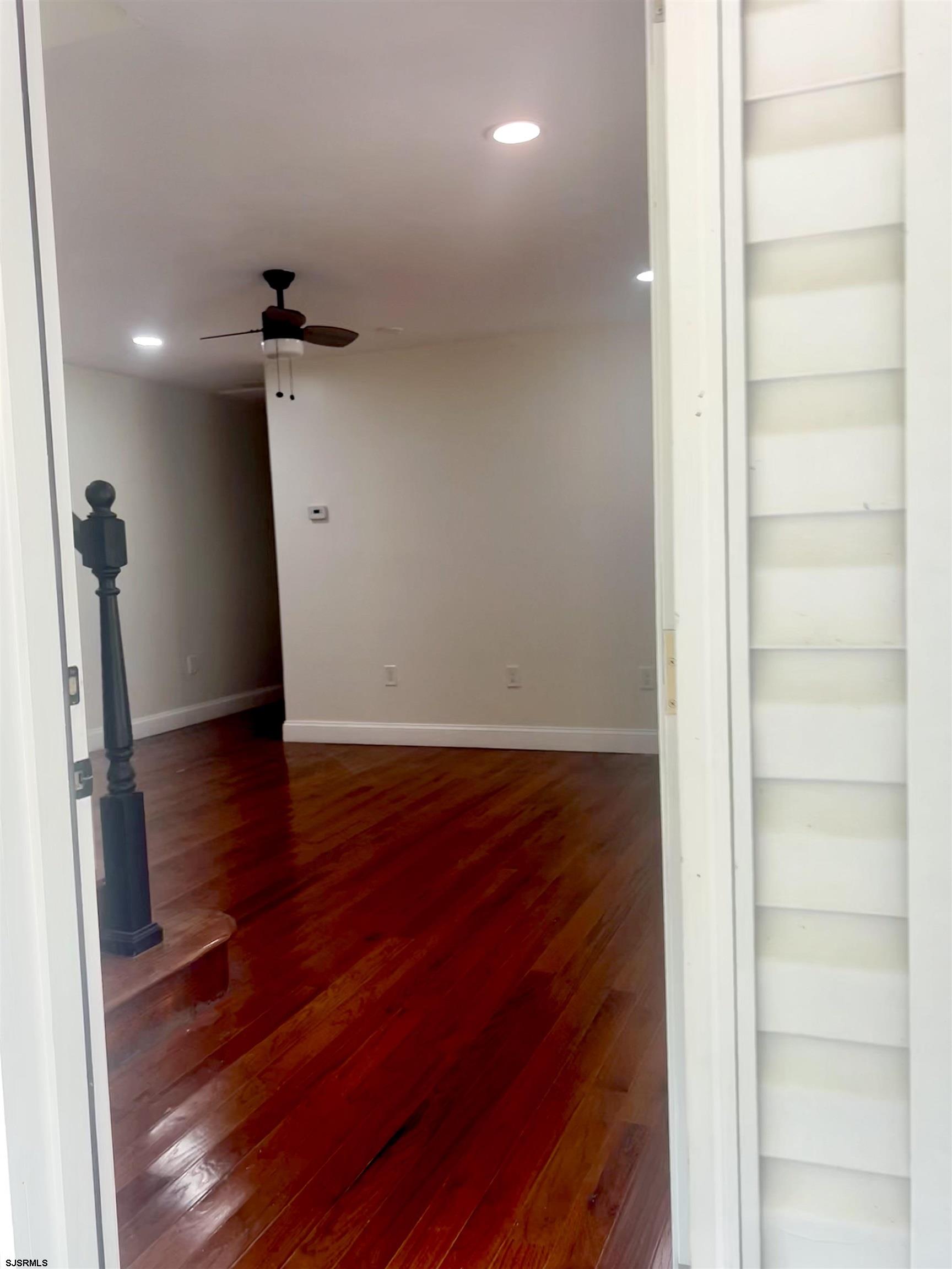 715 Ramah Road Millville, NJ 08332 - Photo 22 of 42 a view of a hallway with wooden floor