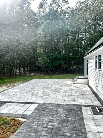 a view of a lake from a yard