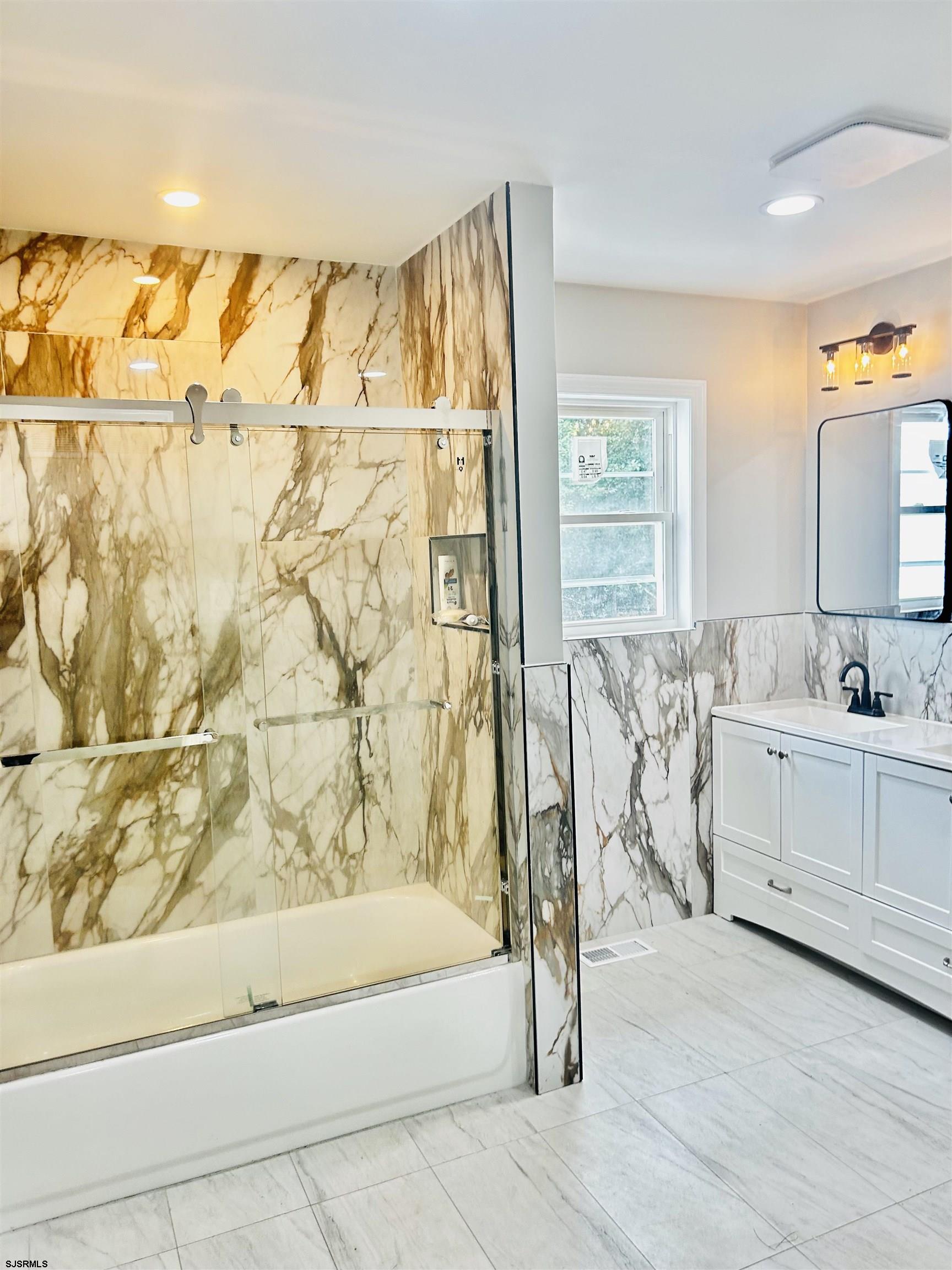 715 Ramah Road Millville, NJ 08332 - Photo 9 of 42 a bathroom with a bathtub and shower