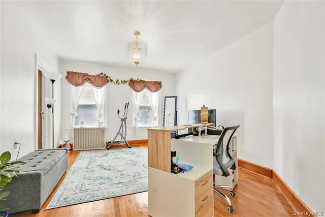 a bed room with a bed and a chair