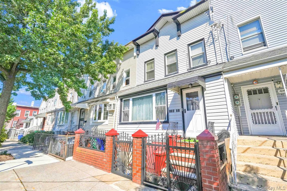 104-21 92nd Avenue Queens, NY 11418 - Photo 2 of 48 a front view of a house