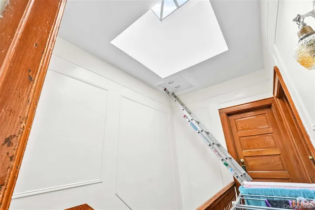 a view of a room with shower and a window