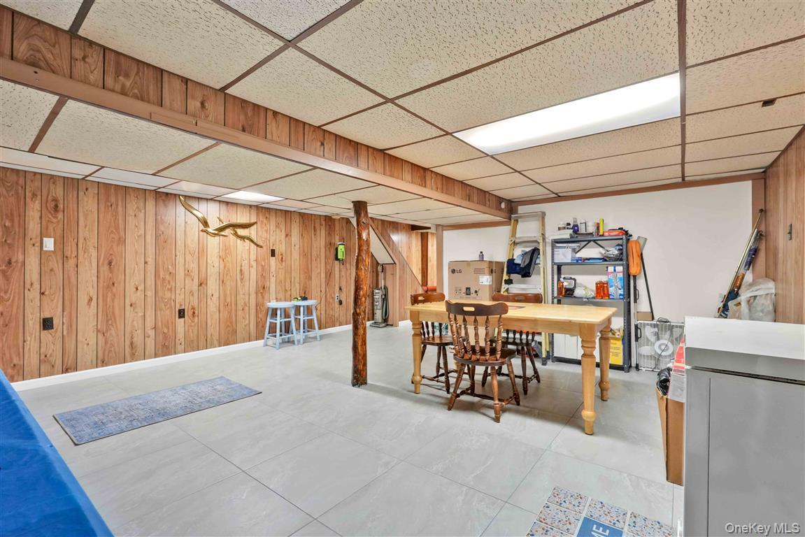 104-21 92nd Avenue Queens, NY 11418 - Photo 31 of 48 a view of a dining room with furniture
