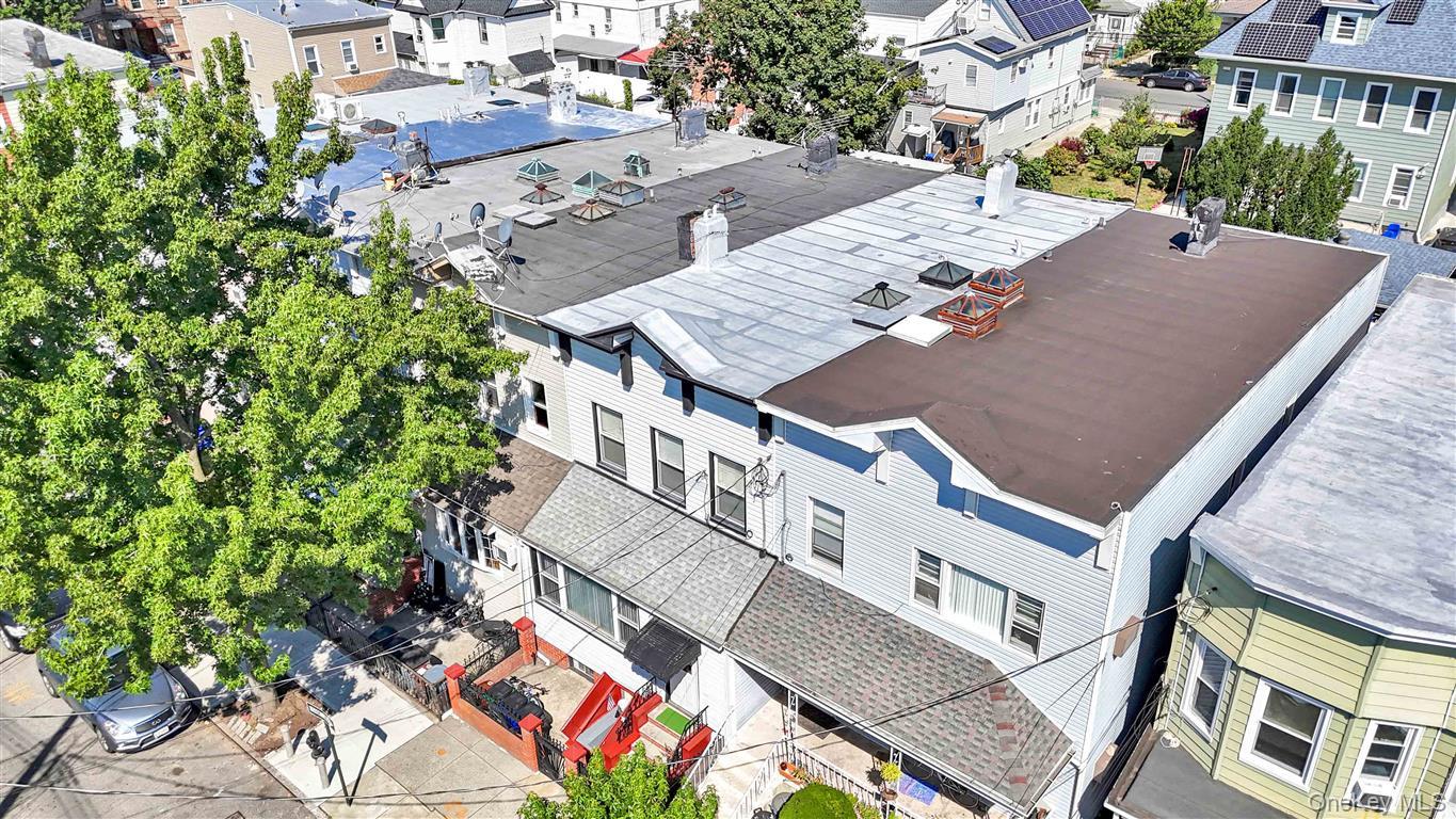104-21 92nd Avenue Queens, NY 11418 - Photo 38 of 48 an aerial view of a house