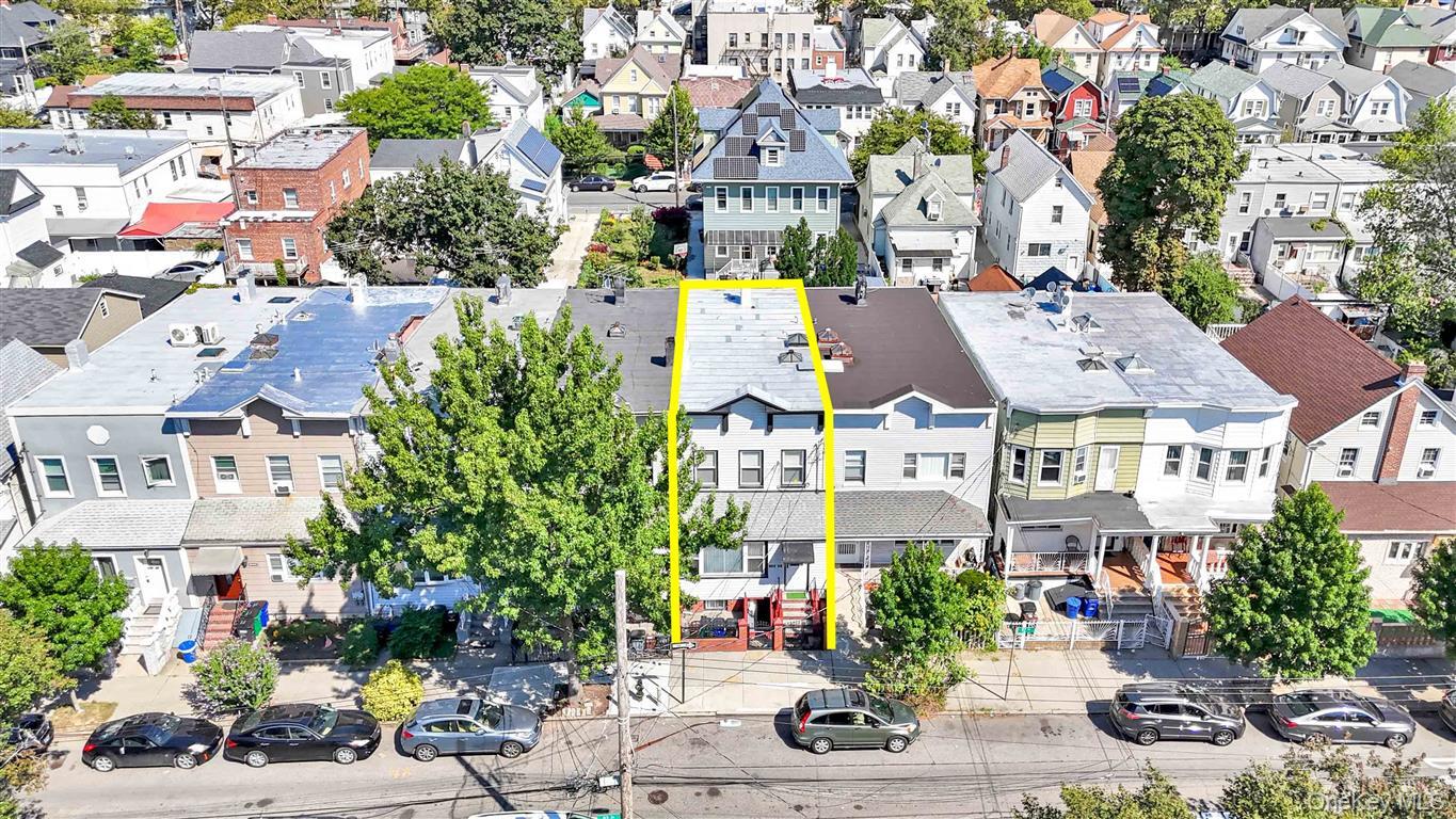 104-21 92nd Avenue Queens, NY 11418 - Photo 40 of 48 a picture of houses with lots of trees