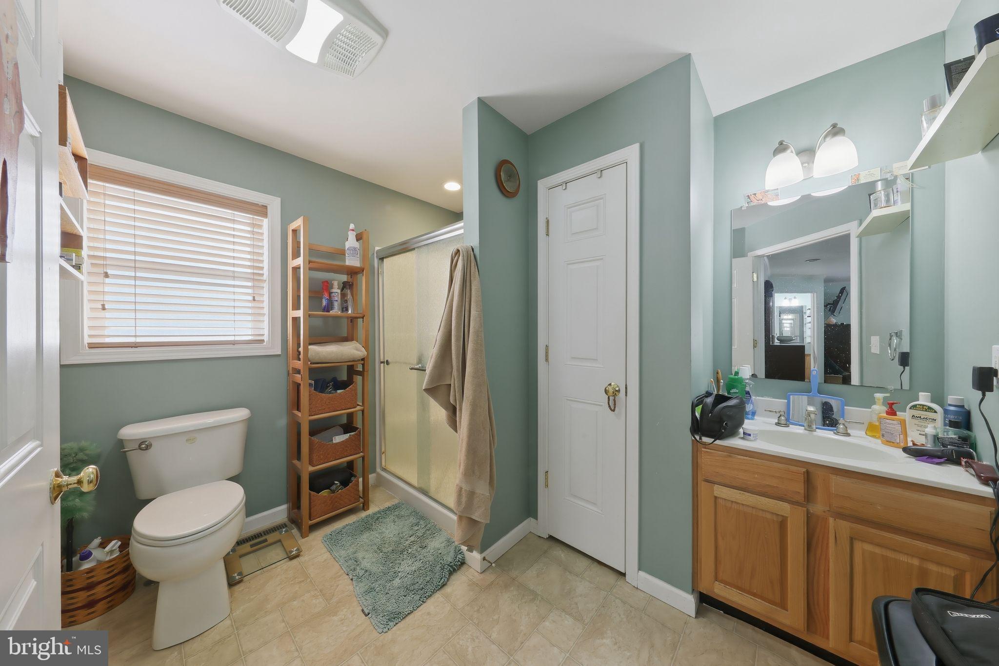 850 Arthursville Road Hartly, DE 19953 - Photo 22 of 40 a bathroom with a toilet sink and mirror