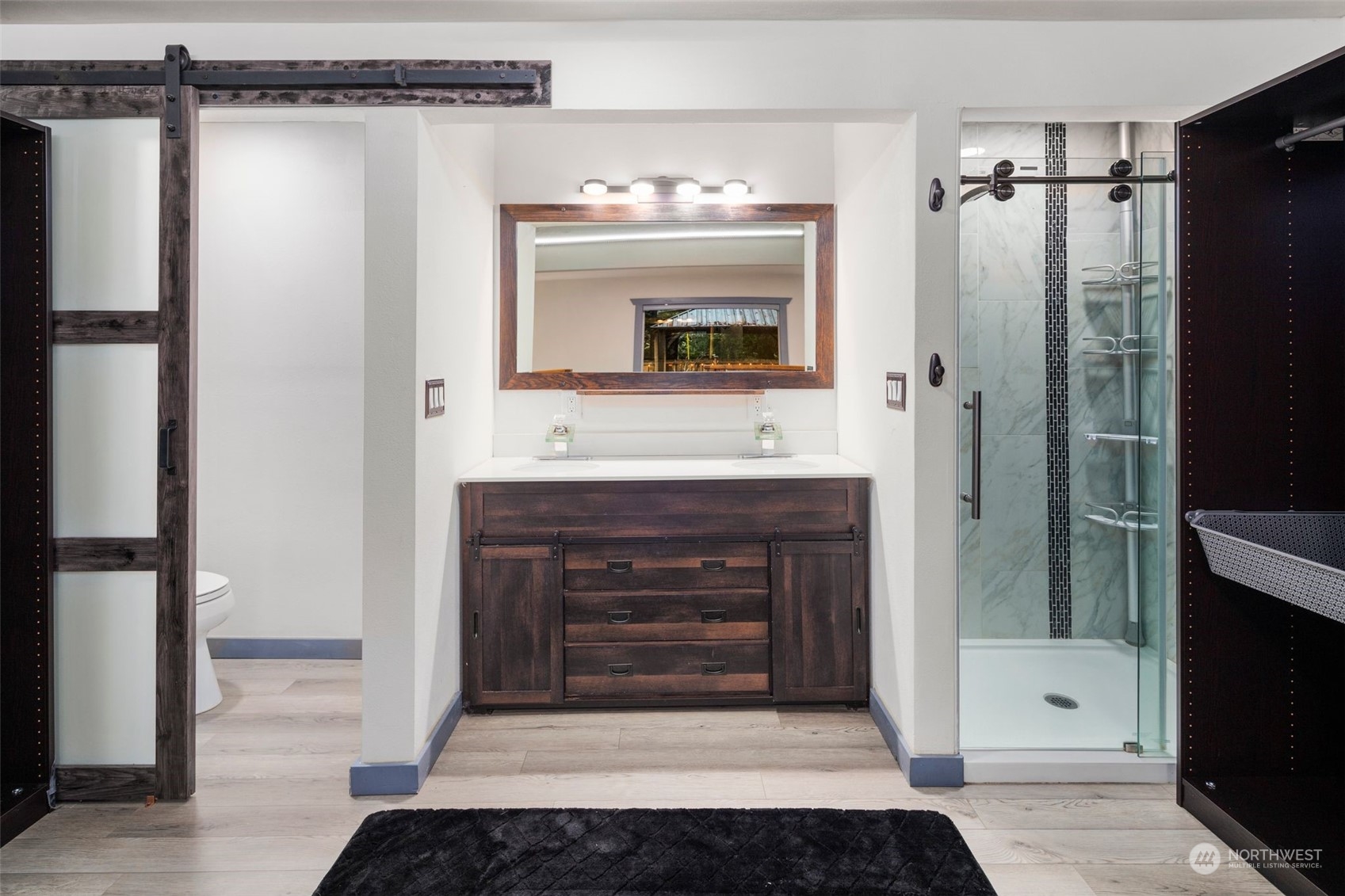 18337 Southeast May Valley Road Issaquah, WA 98027 - Photo 21 of 40 a bathroom with a sink and a mirror