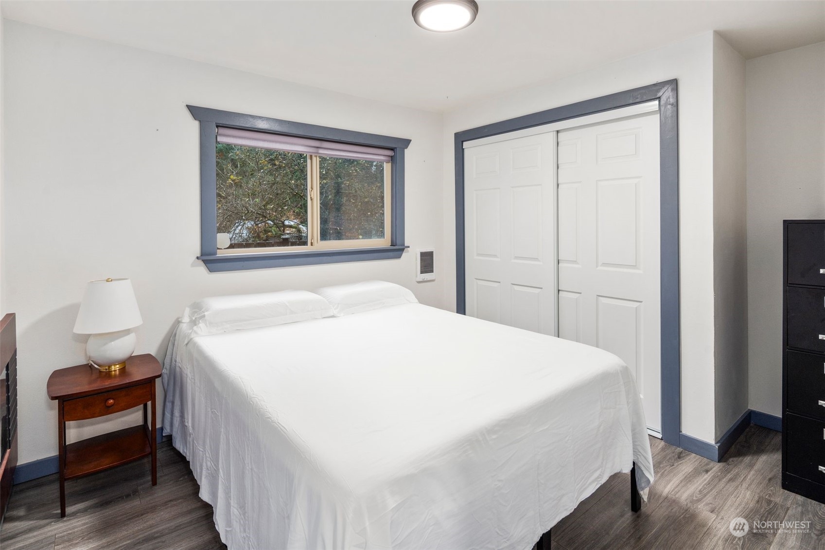 18337 Southeast May Valley Road Issaquah, WA 98027 - Photo 23 of 40 a bedroom with a bed and a window