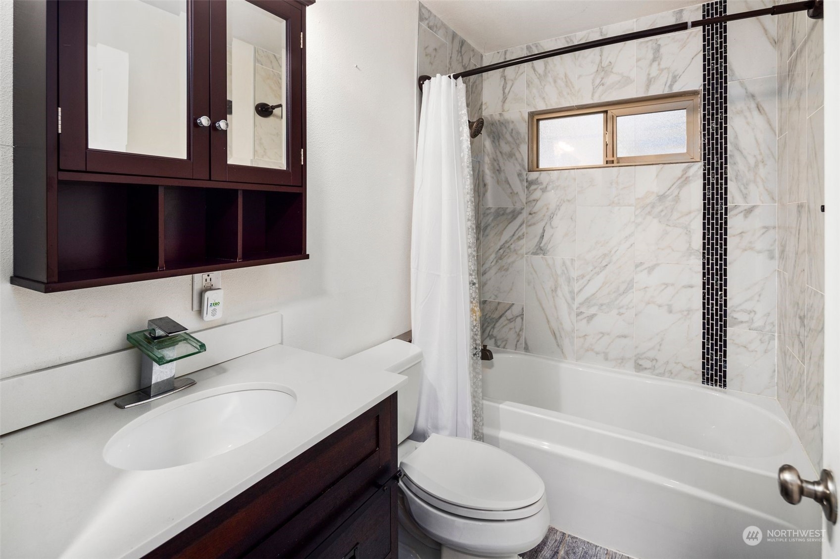 18337 Southeast May Valley Road Issaquah, WA 98027 - Photo 24 of 40 a bathroom with a sink a toilet and shower