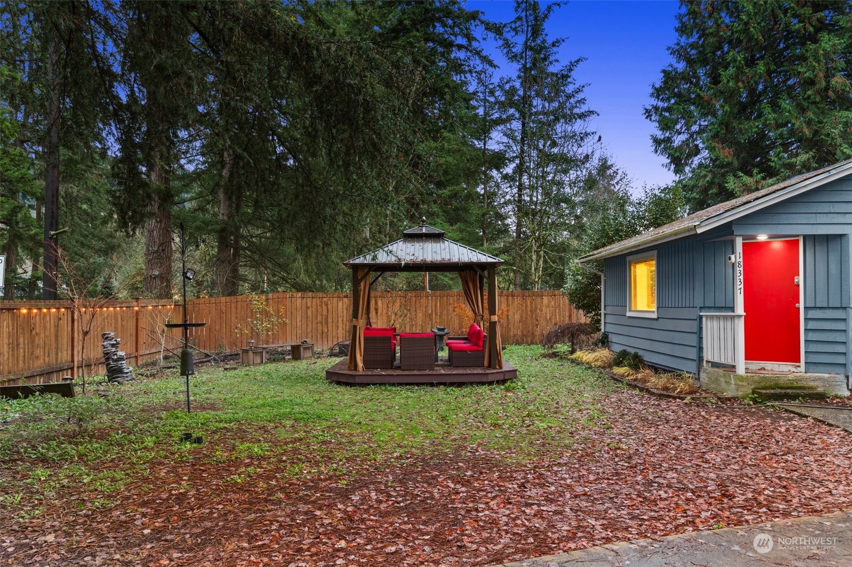 18337 Southeast May Valley Road Issaquah, WA 98027 - Photo 32 of 40 a view of a house with a yard