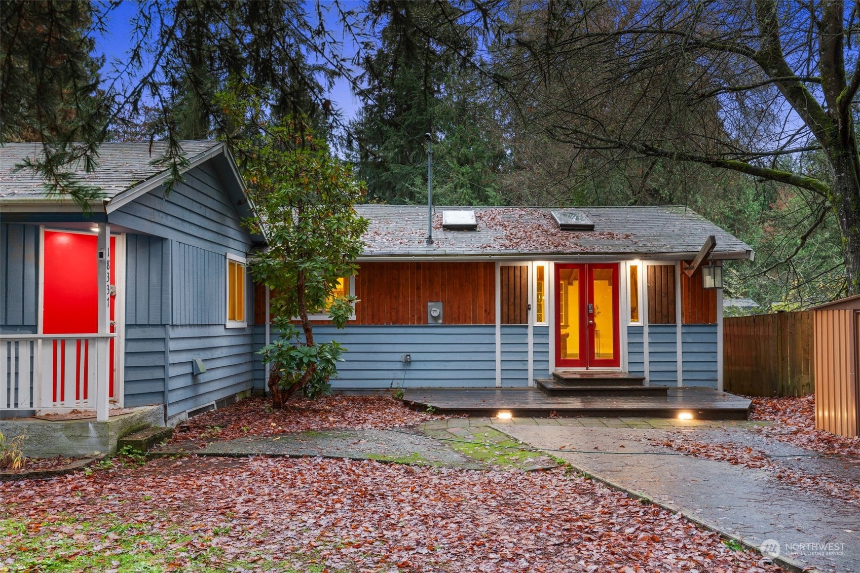 18337 Southeast May Valley Road Issaquah, WA 98027 - Photo 35 of 40 a front view of a house with a yard