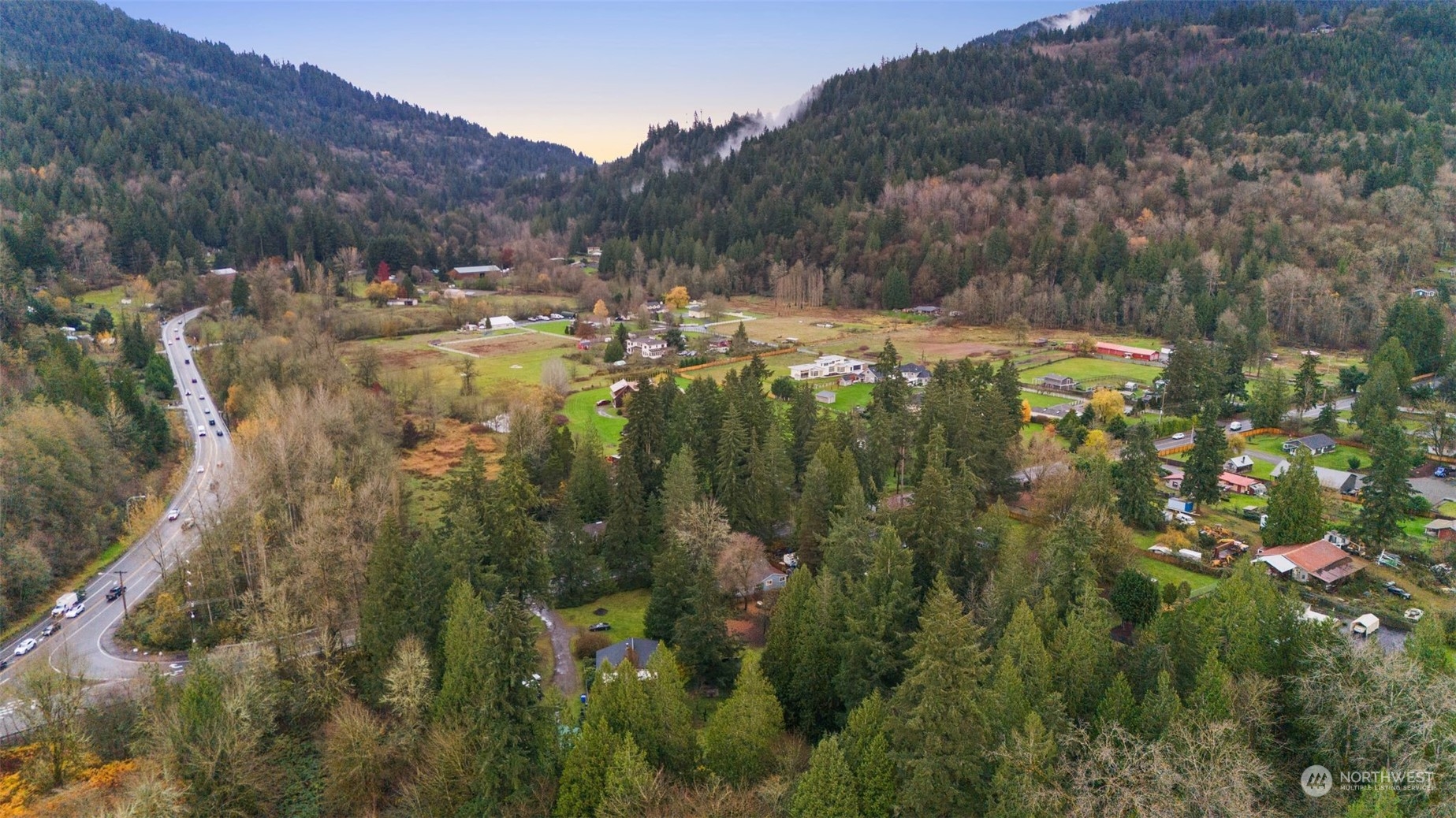 18337 Southeast May Valley Road Issaquah, WA 98027 - Photo 39 of 40 a view of a town with mountains in the background