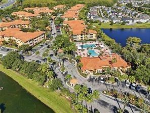 5447 Vineland Road, Unit 1303 Orlando, FL 32811 - Photo 17 of 18 a view of a lake