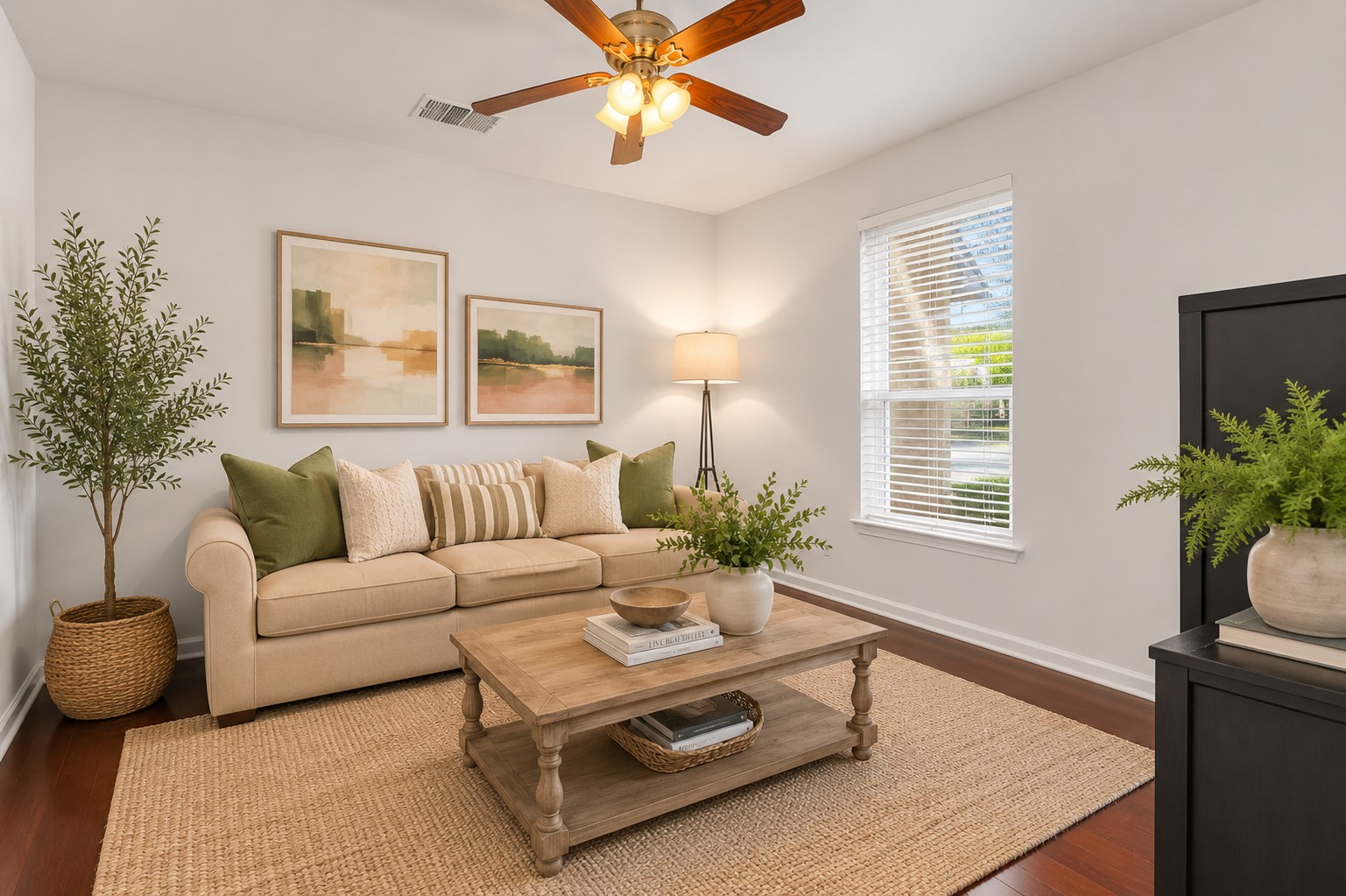 12528 Labrador Cove Austin, TX 78729 - Photo 5 of 40 Virtually Staged to illustrate the potential of this versatile front living room featuring rich hardwood floors, abundant natural light, and soft designer-inspired furnishings. Ideal as a formal living room, home office, reading room, or flex space. Furnishings shown are for visualization purposes only.