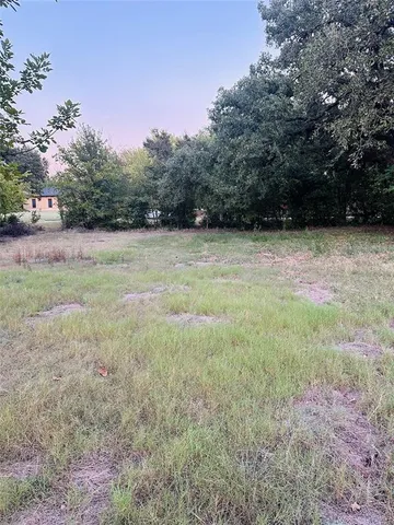 a view of outdoor space with deck and yard