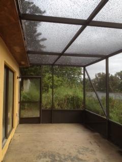 3830 Davis Road Palm Springs, FL 33461 - Photo 4 of 14 screened patio