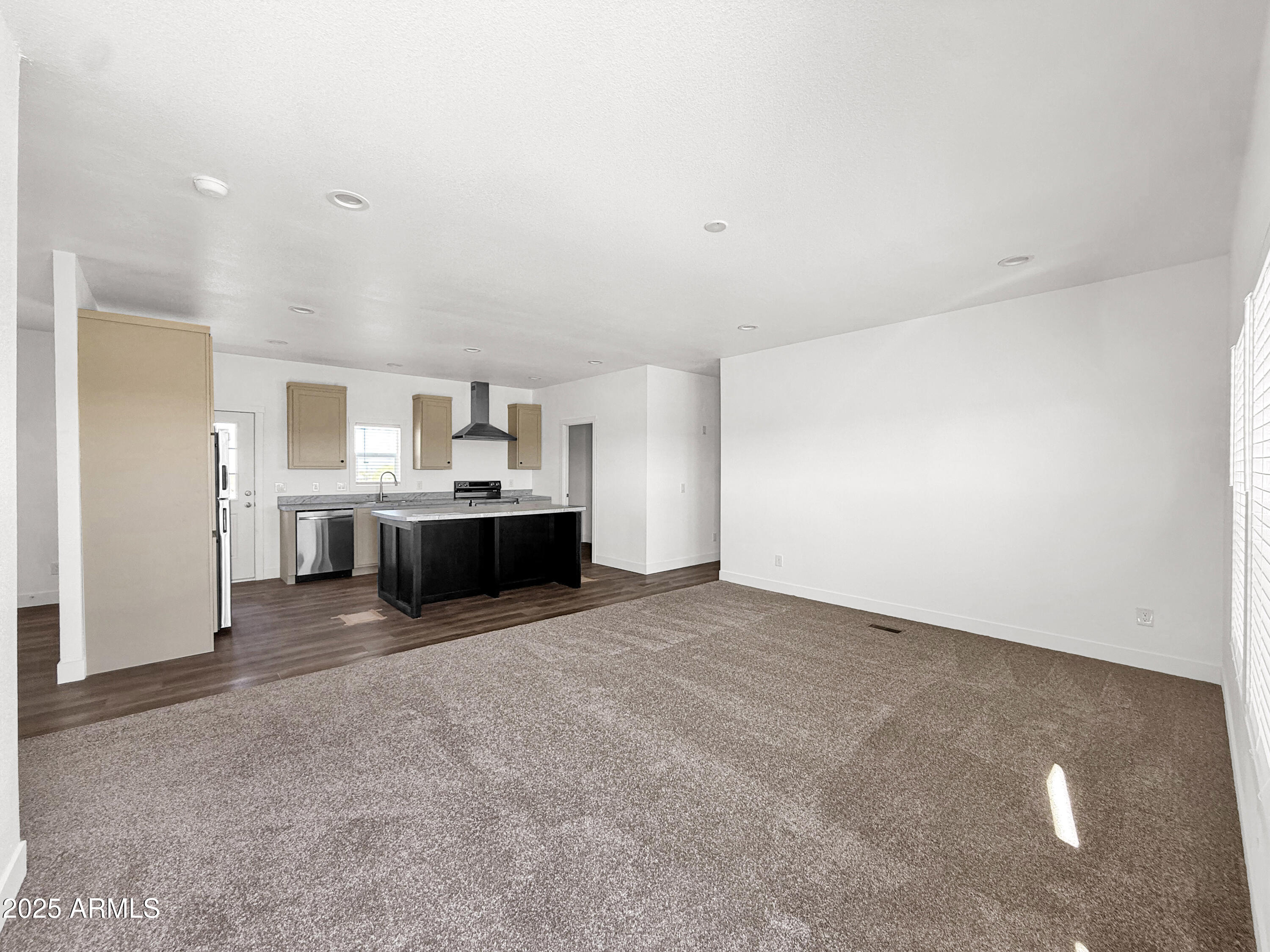 8548 North Page Road Florence, AZ 85132 - Photo 21 of 23 a view of a kitchen with a sink and cabinets