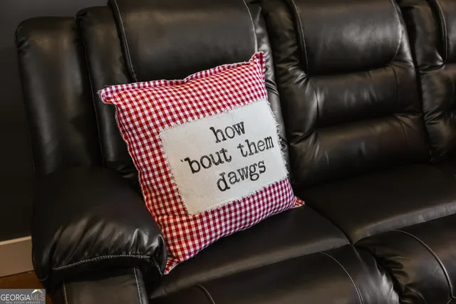 a kitchen with a table and chairs in it