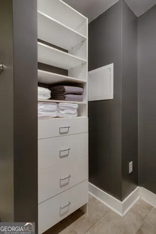 a bathroom with a glass door shower