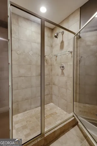 a picture of a table and a vase of flower sitting on a table