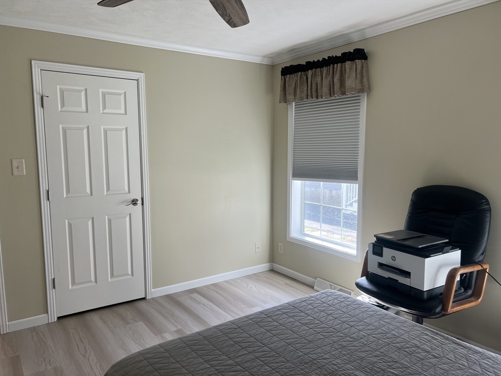 55 Hillview Drive West Springfield, MA 01089 - Photo 11 of 26 a bedroom with a bed and a window