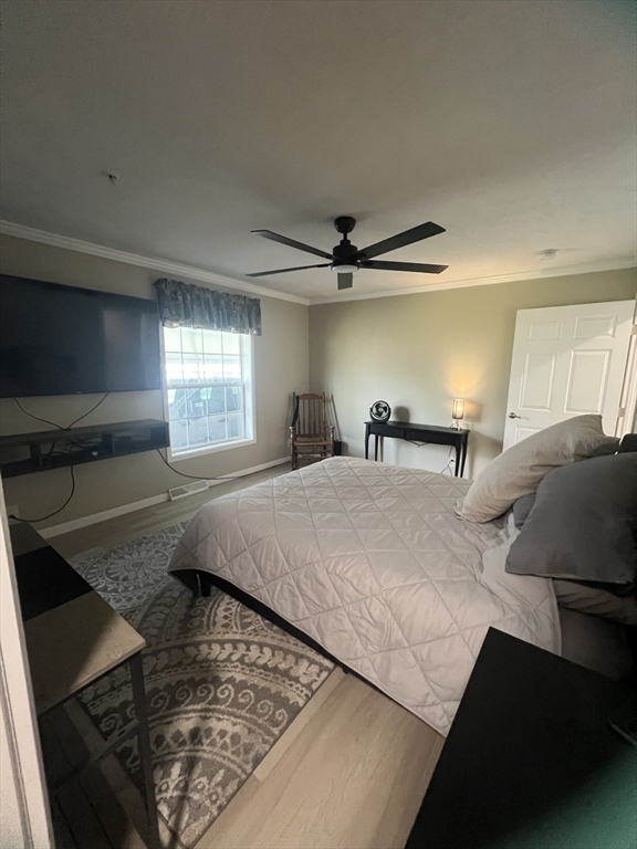 55 Hillview Drive West Springfield, MA 01089 - Photo 12 of 26 a bedroom with a bed and window