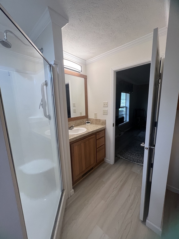 55 Hillview Drive West Springfield, MA 01089 - Photo 16 of 26 a bathroom with a double vanity sink a mirror and a bathtub