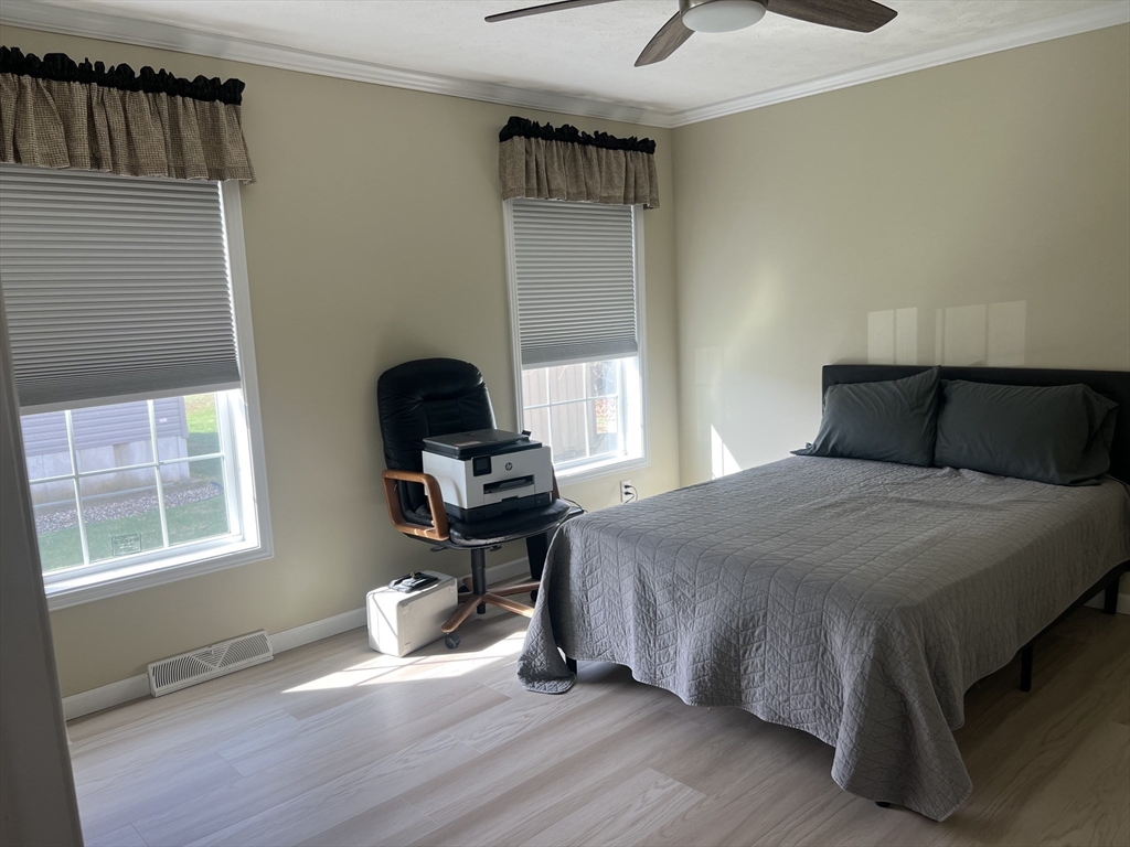 55 Hillview Drive West Springfield, MA 01089 - Photo 17 of 26 a bedroom with a bed and a window