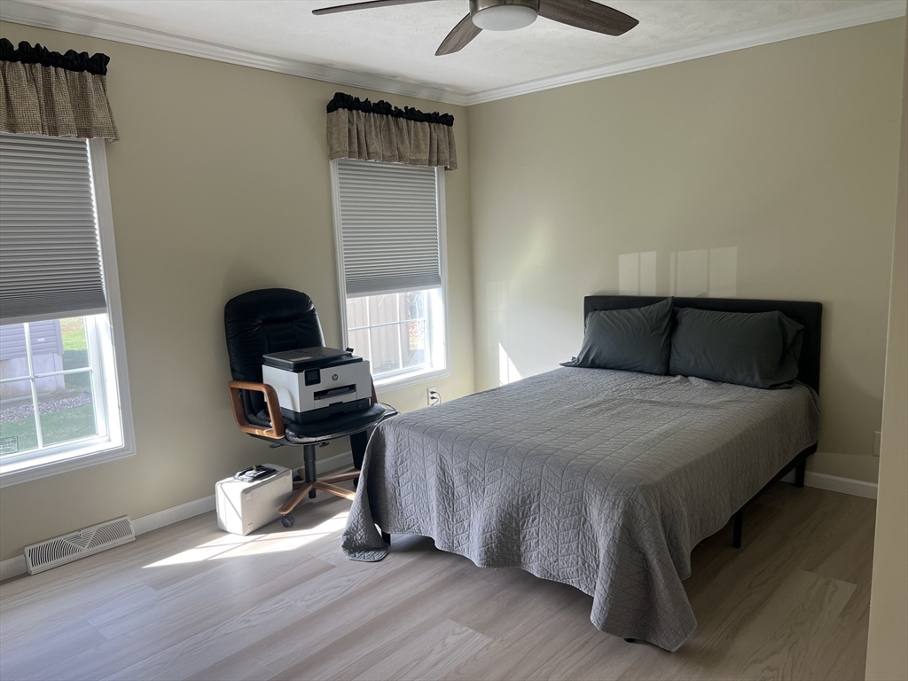 55 Hillview Drive West Springfield, MA 01089 - Photo 19 of 26 a bedroom with a bed and a window