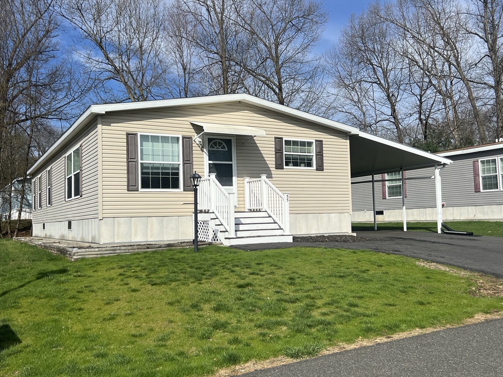 55 Hillview Drive West Springfield, MA 01089 - Photo 2 of 26 a front view of a house with a yard