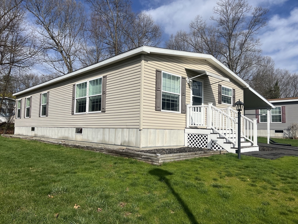 55 Hillview Drive West Springfield, MA 01089 - Photo 25 of 26 a front view of a house with a yard
