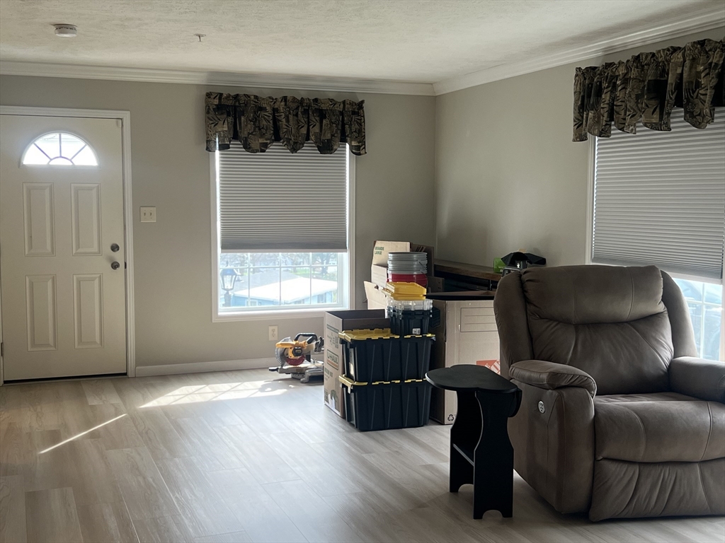 55 Hillview Drive West Springfield, MA 01089 - Photo 3 of 26 a living room with furniture and a window