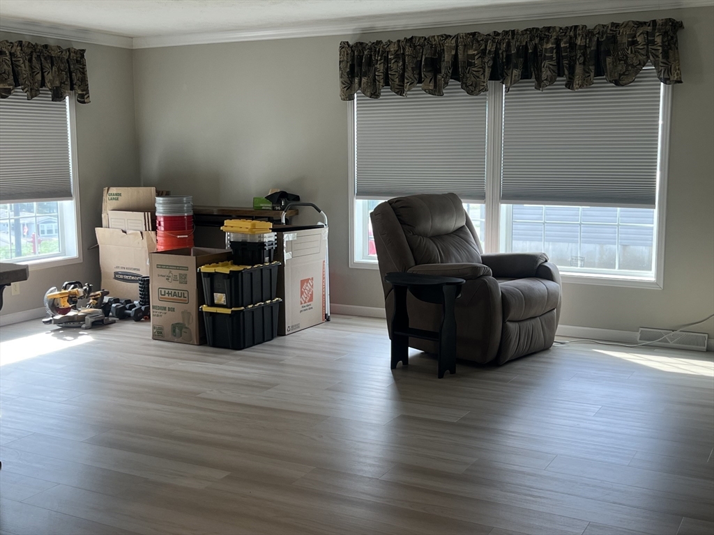 55 Hillview Drive West Springfield, MA 01089 - Photo 5 of 26 a living room with furniture and a wooden floor