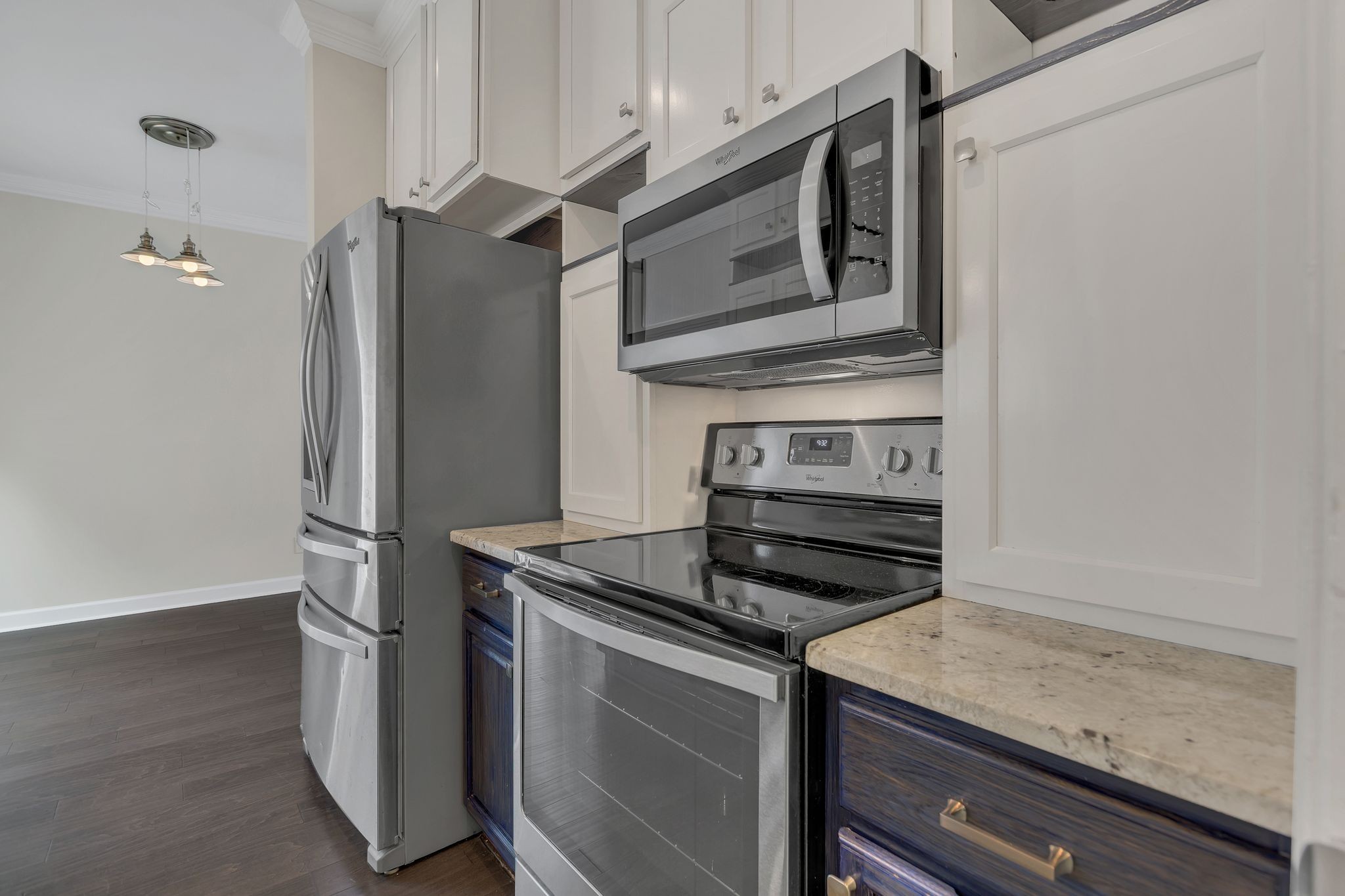 2271 Dewey Drive, Unit J3 Spring Hill, TN 37174 - Photo 15 of 31 a kitchen with stainless steel appliances granite countertop a refrigerator and a stove