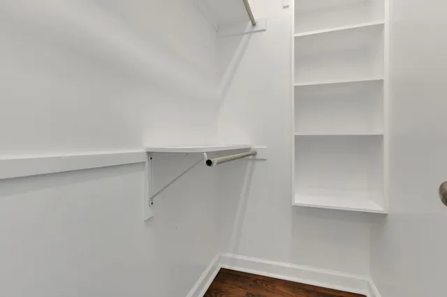 a view of an empty walk in closet