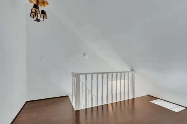 a view of staircase with white walls