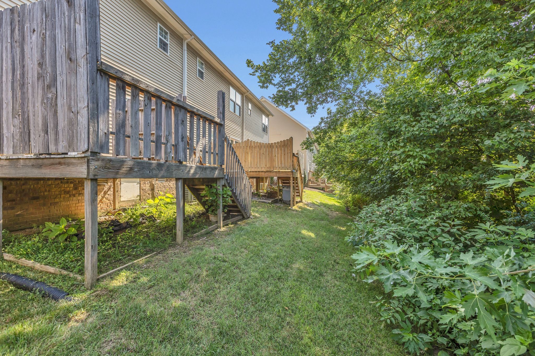 2271 Dewey Drive, Unit J3 Spring Hill, TN 37174 - Photo 30 of 31 a view of a house with a yard