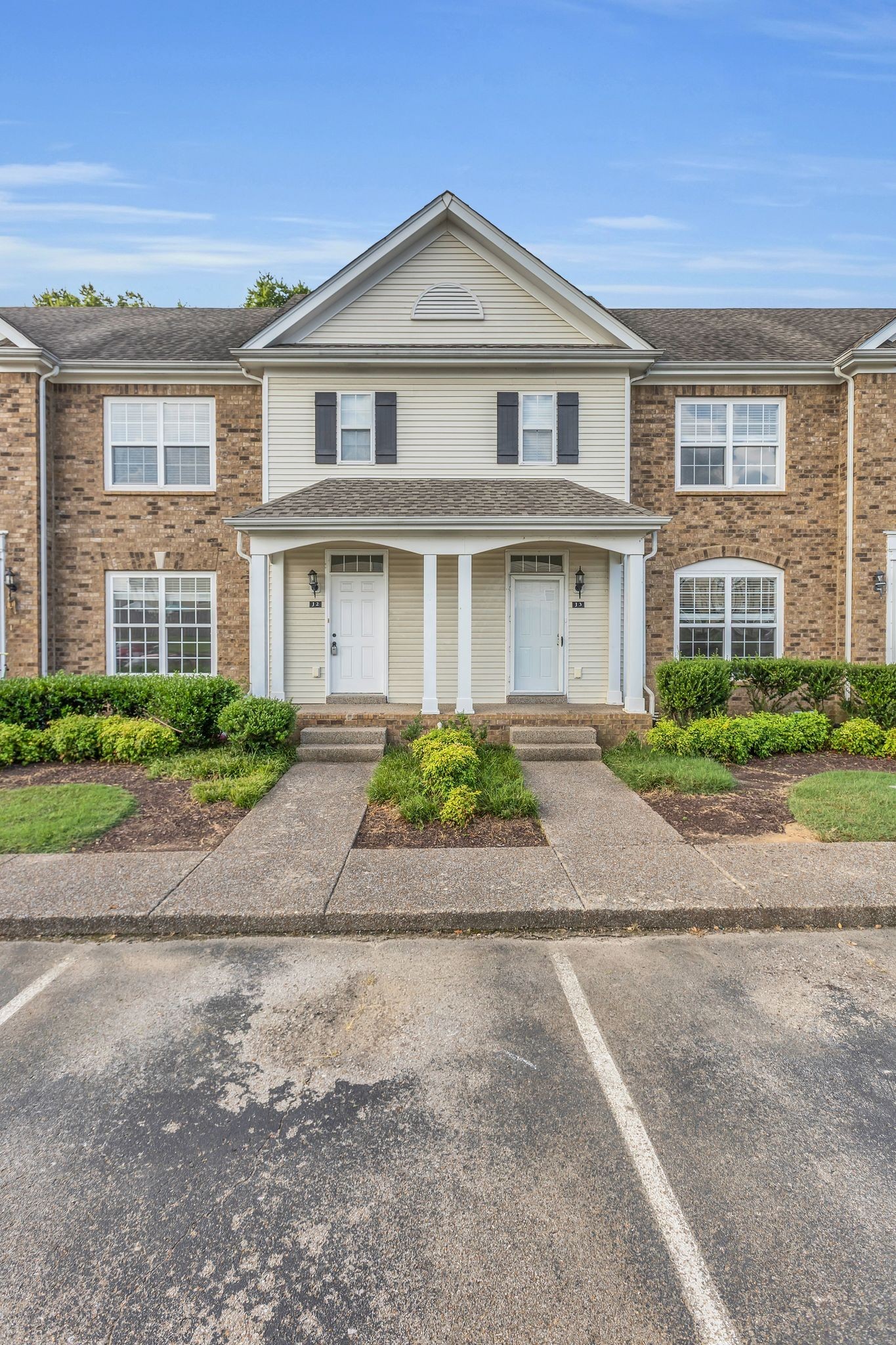 2271 Dewey Drive, Unit J3 Spring Hill, TN 37174 - Photo 3 of 31 a front view of multiple houses