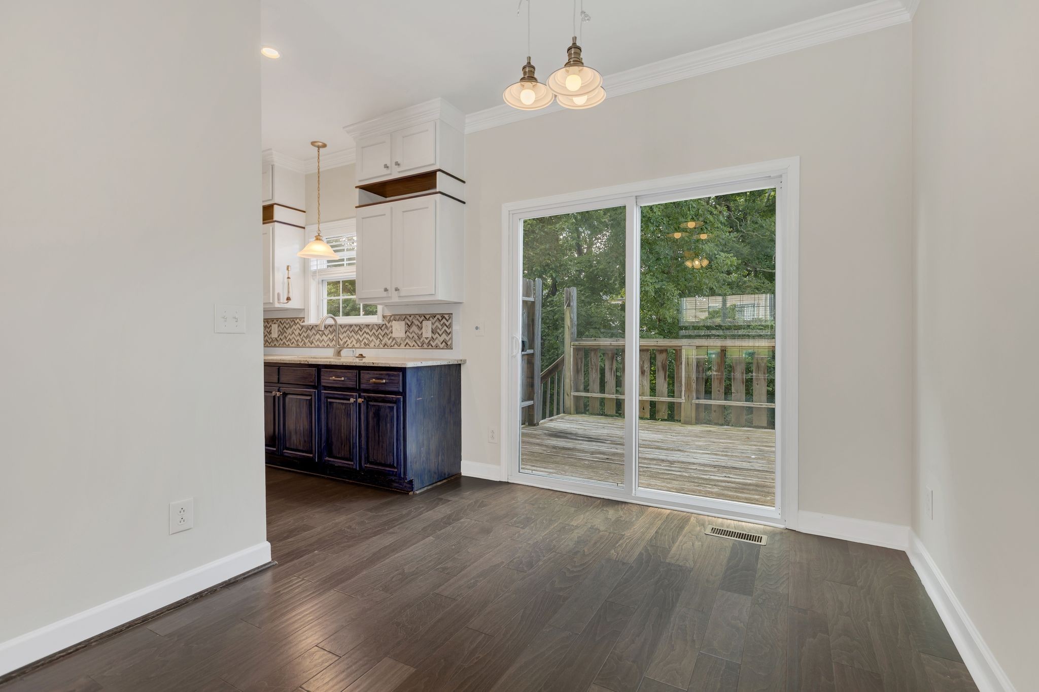 2271 Dewey Drive, Unit J3 Spring Hill, TN 37174 - Photo 10 of 31 an empty room with wooden floor and a window