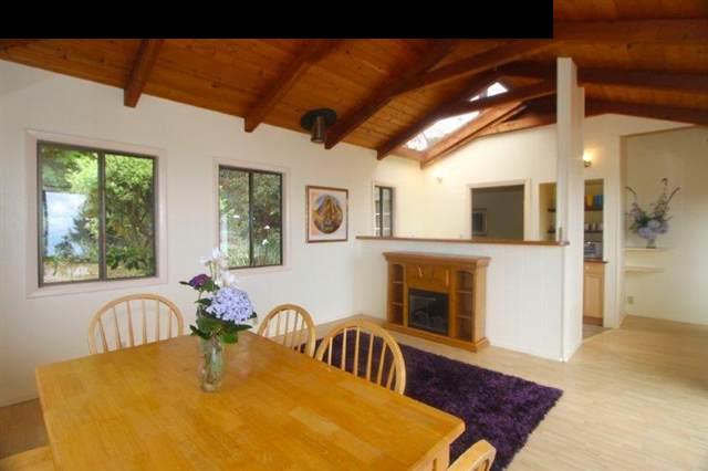 333 Middle Road Kula, HI 96790 - Photo 21 of 25 a view of a dining room with furniture window and wooden floor