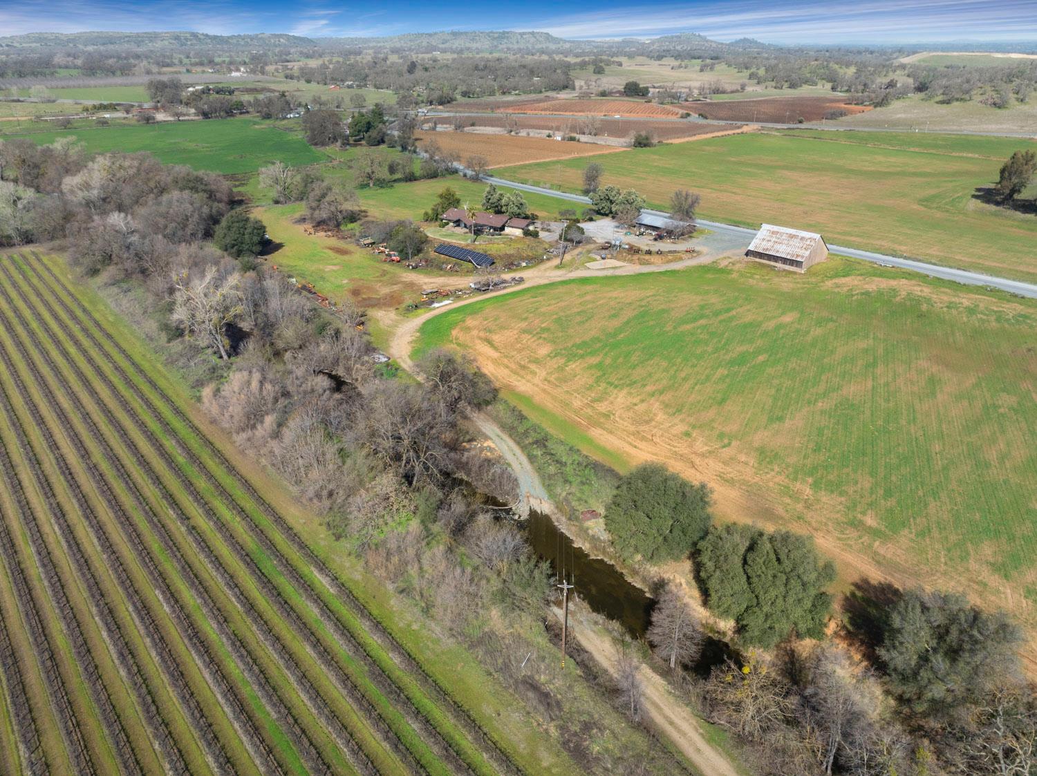 3270 Jackson Valley Road Ione, CA 95640 - Photo 2 of 34 a view of a lake with an ocean beach